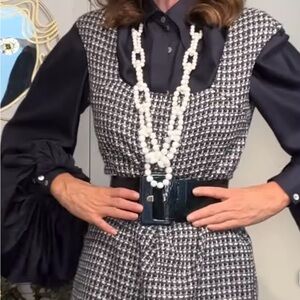 New, never worn hand made pearl link necklace on blue velvet ribbon.